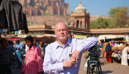 Host Rudy Maxa in India